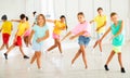 Portrait of group of boys and girls having dancing class in studio