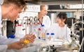 Portrait of group of European and Chinese scientists working tog