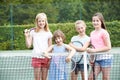 Portrait Of Group Of Girls Playing Tennis On Court Royalty Free Stock Photo