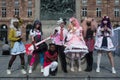 Portrait of group of girls wearing manga cosplay costumes in the street