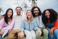 Portrait of a group of happy best friends looking at camera. Young adult people laughing together and staring front Royalty Free Stock Photo