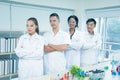 Portrait group multi-ethnic scientists standing smiling happily and cross one\'s arm in laboratory,conducting scientific Royalty Free Stock Photo