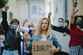 Group of people activists protesting on streets, women march and demonstration concept.