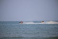 Portrait of a group of people playing outdoor sports on a jet ski on the sea