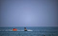 Portrait of a group of people playing outdoor sports on a jet ski on the sea