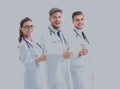 Team of medical professionals looking at camera, showing thumbs Royalty Free Stock Photo