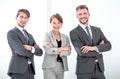 Portrait of a group of successful youngsters on a light background.