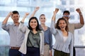 We outperformed, it paid off. Portrait of a group of young businesspeople cheering in a modern office. Royalty Free Stock Photo