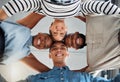 Portrait of a group of young diverse businesspeople smiling and huddling in support at work. Joyful colleagues standing Royalty Free Stock Photo