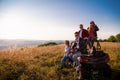 Group of young people driving a off road buggy car Royalty Free Stock Photo