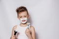 Portrait of a guy in shaving cream holding a razor and brush Royalty Free Stock Photo