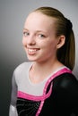 A portrait of a gymnast on a white background.