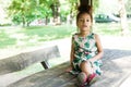 Portrait of half-caste children in park