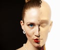 Portrait of half woman`s face transformed is human head anatomy model