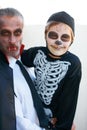 Portrait, halloween and costume with a father and his son outdoor for a trick or treat tradition together. Family