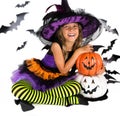 Halloween kids, Happy scary girl dressed up in halloween costumes of witch, sorcerer and vampire Dracula for pumpkin patch Royalty Free Stock Photo