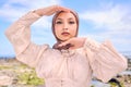 Portrait, hands or fashion with an islam woman outdoor in a hijab for religion or contemporary style. Islam, faith or Royalty Free Stock Photo