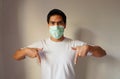 Portrait of handsome Asian man wearing protective mask Royalty Free Stock Photo