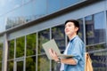 Portrait of handsome Asian student using computer laptop Royalty Free Stock Photo