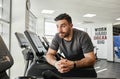 Portrait handsome bearded friendly fitness gym guy looking away Royalty Free Stock Photo