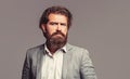 Portrait of handsome bearded man in suit. Male beard and mustache. Sexy male, brutal macho, hipster. Elegant handsome Royalty Free Stock Photo