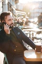 Portrait of a handsome bearded man talking on mobile phone Royalty Free Stock Photo