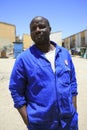 Portrait of handsome black African man with his workwear in Namibia