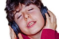 Portrait of handsome boy listening music by headphone Royalty Free Stock Photo