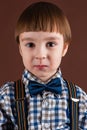 Portrait handsome boy in shirt with bow tie Royalty Free Stock Photo