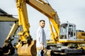 Builder at the shop with heavy machinery Royalty Free Stock Photo