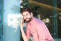 Handsome business casual man talking on mobile phone Royalty Free Stock Photo