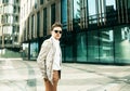 Portrait of an handsome businessman, summer day, outdoors near modern business centre