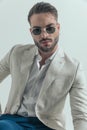 Portrait of handsome businessman wearing untied shirt and glasses Royalty Free Stock Photo