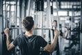 Portrait handsome caucasian young man healthy fitness doing exercise at indoor workout in gym.