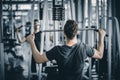 Portrait handsome caucasian young man healthy fitness doing exercise at indoor workout in gym. Royalty Free Stock Photo