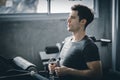 Portrait handsome caucasian young man healthy fitness doing exercise at indoor workout in gym. Royalty Free Stock Photo