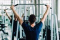 Portrait handsome caucasian young man healthy fitness doing exercise at indoor workout in gym. Royalty Free Stock Photo