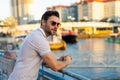 Portrait of handsome confident man in city. Portrait of confident man in modern big american city. Stylish lambersexual Royalty Free Stock Photo