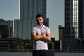 Portrait of handsome confident man in city. Portrait of confident man in modern big american city. Stylish lambersexual Royalty Free Stock Photo