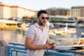 Portrait of handsome confident man in city. Portrait of confident man in modern big american city. Stylish lambersexual Royalty Free Stock Photo