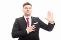 Portrait of handsome corporate business man taking oath Royalty Free Stock Photo