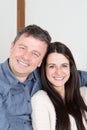 handsome father and teenager daughter hugging looking at camera and smiling Royalty Free Stock Photo