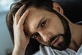 Portrait of a handsome gloomy man looking at you Royalty Free Stock Photo