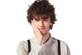 Portrait of a handsome guy in a white shirt with suspenders over Royalty Free Stock Photo