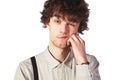 Portrait of a handsome guy in a white shirt with suspenders over Royalty Free Stock Photo