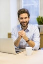 Portrait of handsome hipster style bearded man in office Royalty Free Stock Photo