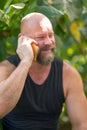 Portrait of a handsome macho man playing with his beard Royalty Free Stock Photo