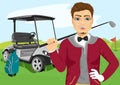 Portrait of handsome male golfer with golf club