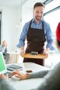 Handsome Waiter Serving Drinks Royalty Free Stock Photo