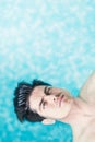 Portrait of a handsome man floating on water Royalty Free Stock Photo